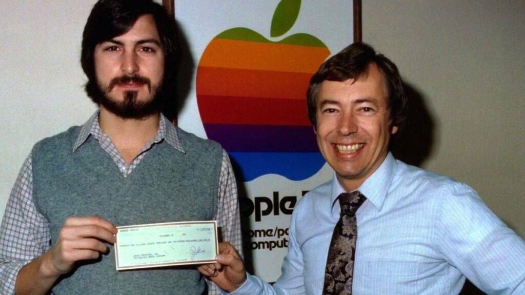 Steve Jobs and Mike Markkaula. 